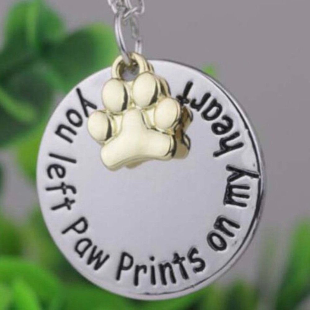 You left 🐾 prints on my heart necklace
